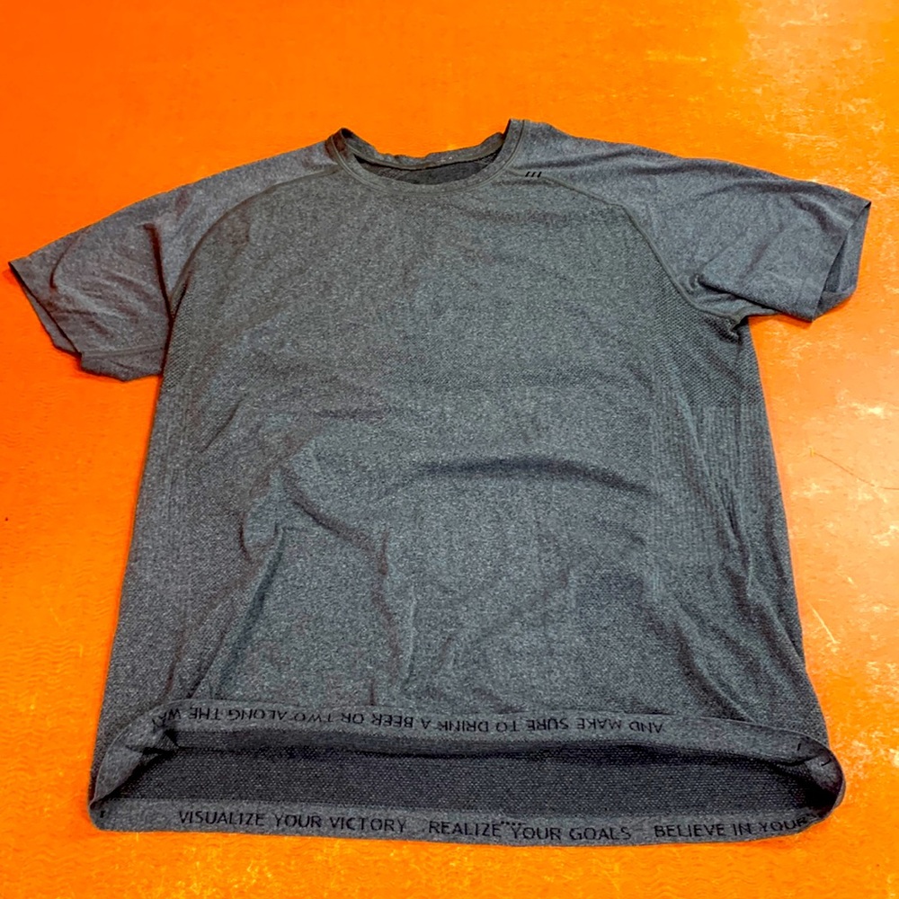 Grey Lululemon workout/running tee shirt. Dri sport